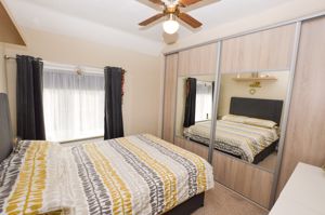 Bedroom One- click for photo gallery